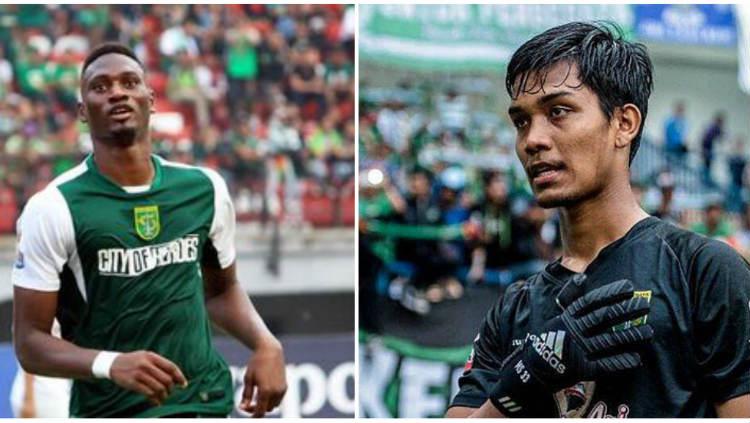 Striker Persebaya Surabaya, Amido Balde (kiri), dan kiper Persebaya, Miswar Saputra.