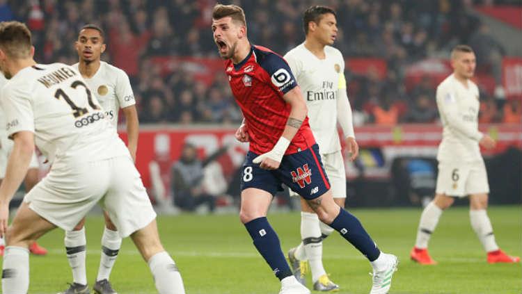 Ekspresi pemain Lille, Xeka usai mencetak gol ke gawang PSG.