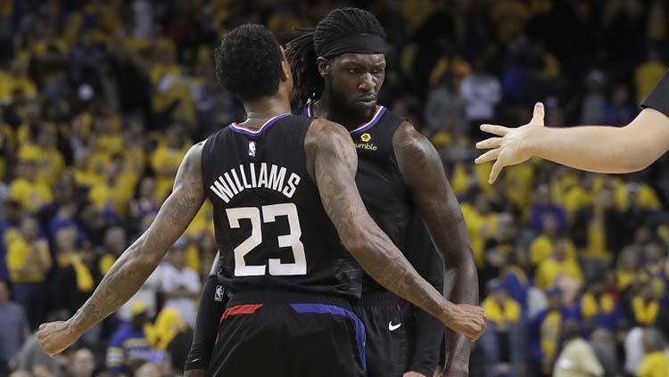 Pemain Clippers merayakan kemenangan saat melawan Warriors di NBA Playoffs. - INDOSPORT