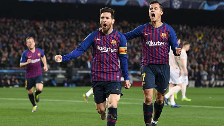 Selebrasi Lionel Messi usai cetak gol ke gawang Manchester United. - INDOSPORT