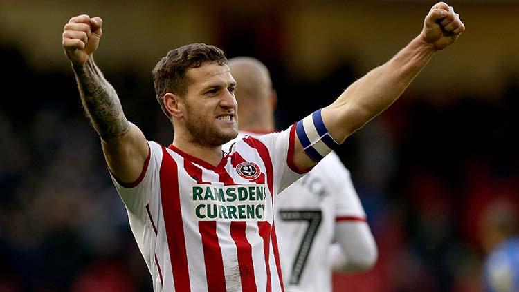 Kapten Sheffield United, Billy Sharp, yang menjadi pemain kunci The Blades melaju ke Liga Primer Inggris 2019/10. - INDOSPORT