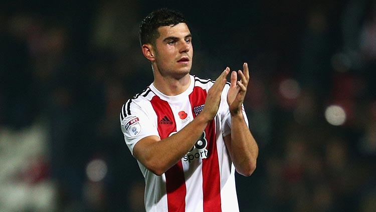 Bek Sheffield United, John Egan merayakan kemenangan. Copyright: Conor Molloy/Getty Images