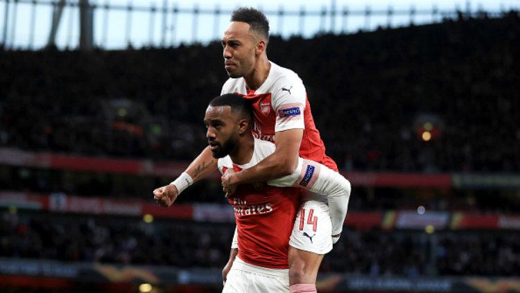 Pierre-Emerick Aubameyang ternyata bukan satu-satunya bomber Arsenal yang angkat kaki dari Emirates Stadium. Pasalnya, Olympique Lyon terang-terangan ingin membajak bintang The Gunners lain yakni Alexandre Lacazette.