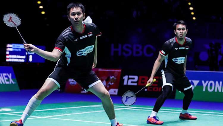 Mohammad Ahsan/Hendra Setiawan di ajang All England Open 2019. Pada tahun 2023 ini, mereka berpeluang bertemu Aaron Chia/Soh Wooi Yik asal Malaysia. - INDOSPORT