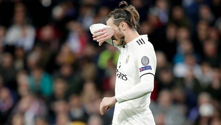 Ekspresi kecewa dari pemain bintang Real Madrid, Gareth Bale. Copyright: Soccrates/Getty Images