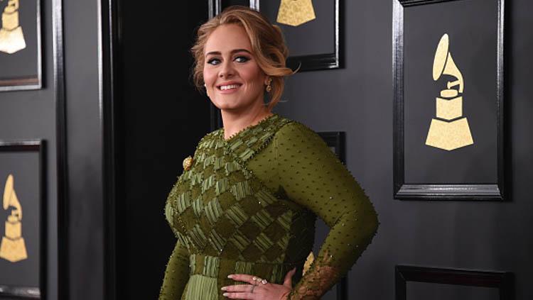 Penyanyi ternama Inggris, Adele, mengaku tidak ingin ikut-ikutan eksis menciptakan lagu untuk viral di TikTok. - INDOSPORT