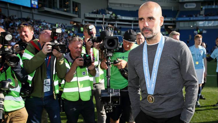 Pelatih Manchester City, Pep Guardiola (Photo by Matthew Ashton - AMA/Getty Images). - INDOSPORT