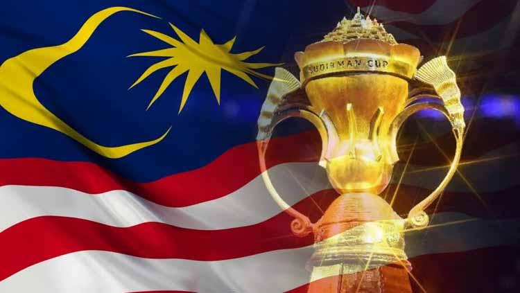 Piala Sudirman dan bendera Malaysia Copyright: Shutterstock/Eli Suhaeli