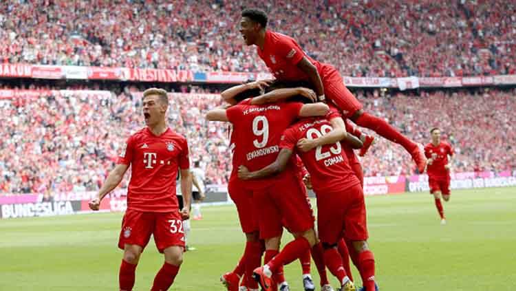 Aksi selebrasi pemain Bayern Munchen usai Kingsley Coman mencetak gol. TF-Images/Getty Images Copyright: TF-Images/Getty Images