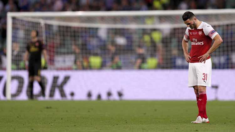Sead Kolasinac tertunduk lesu kalah telak dari Chelsea. Joosep Martinson - UEFA/UEFA via Getty Images) Copyright: Joosep Martinson - UEFA/UEFA via Getty Images)