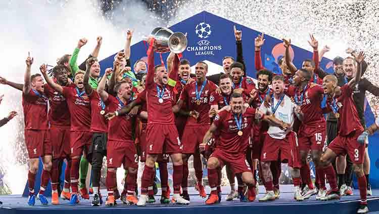Kegembiraan ditunjukan oleh para pemain Liverpool keluar sebagai juara Liga Champions musim ini. TF-Images/Getty Images Copyright: TF-Images/Getty Images