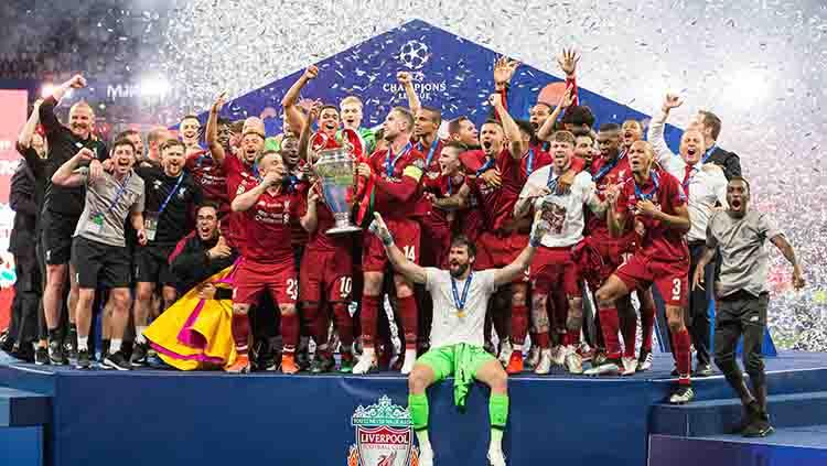 Kegembiraan ditunjukan oleh para pemain Liverpool keluar sebagai juara Liga Champions musim ini. TF-Images/Getty Images Copyright: TF-Images/Getty Images