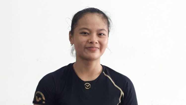 Lifter Windy Cantika Aisah membawa pulang medali emas cabang olahraga angkat besi SEA Games 2019. Foto: Mercy Raya/detikSport - INDOSPORT