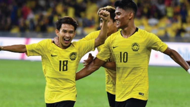 Selebrasi Timnas Malaysia di pertandingan putaran pertama Kualifikasi Piala Dunia 2022 zona Asia. (Foto: the-afc.com) - INDOSPORT