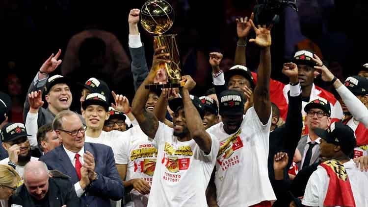 Keceriaan wajah tim Toronto Raptors usai kalahkan Golden State Warriors sekaligus juara NBA musim 2019 di Oracle Arena. Jumat, 14/06/19.
