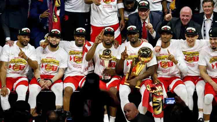 Sesi foto tim Toronto Raptors juara NBA musim ini. Jumat, 14/06/19. Cunningham/Getty Images