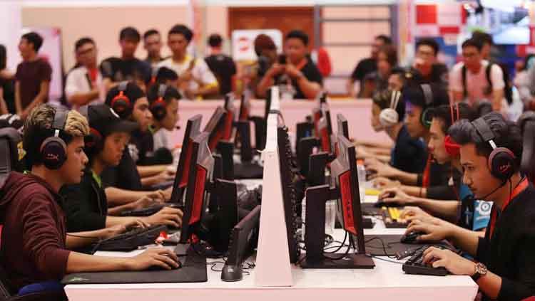 Garena Indonesia tetap melanjutkan kalender eSports dari game-game yang mereka tangani selama dua bulan meski tengah dihantui wabah virus corona (COVID-19). - INDOSPORT