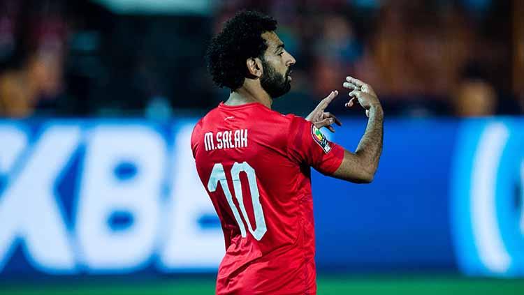 Mohamed Salah pada laga pembuka Piala Afrika 2019 melawan Zimbabwe di Cairo International Stadium, Sabtu (22/06/19). Media/Getty Images. - INDOSPORT