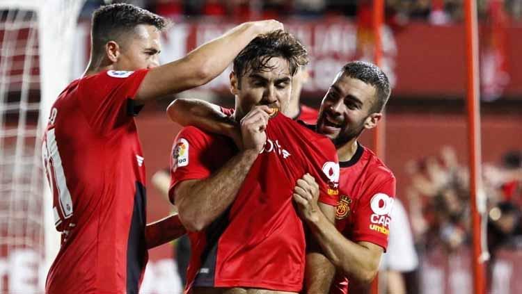 Pemain RCD Mallorca merayakan kemenangan melawan Depotivo Coruna di Iberostar Stadium.
