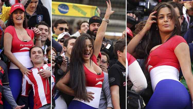 Deretan foto aksi Larissa Riquelme saat menyaksikan laga perempatfinal Paraguay vs Brasil di laga Copa America di Estadio Único Ciudad de La Plata (17/07/11). Wagner Carmo/LatinContent via Getty Images - INDOSPORT