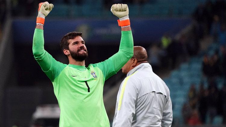 Alisson Becker saat memperkuat Timnas Brasil di Copa America 2019. Copyright: Koji Watanabe/Getty Images