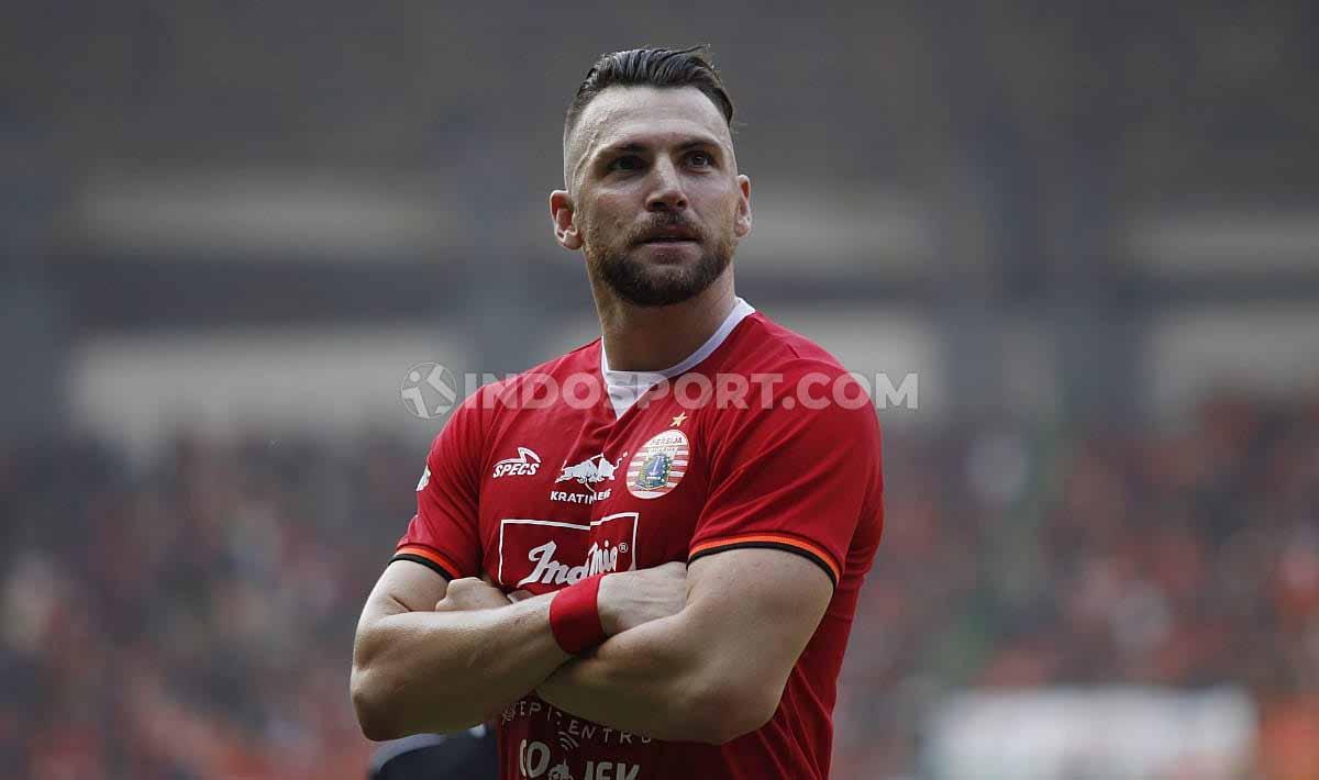 Indosport - Aksi selebrasi Marko Simic ke gawang PSS Sleman.