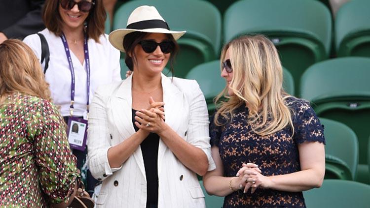 Meghan Markle nonton Serena Williams berlaga di Wimbledon (Photo by Laurence Griffiths/Getty Images) - INDOSPORT