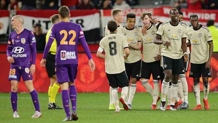 Aksi selebrasi pemain Manchester United setelah menang 2-0 atas Perth Glory di Optus Stadium (13/07/19).