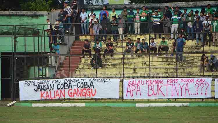 Kelompok suporter klub Liga 2 Indonesia, PSMS, bersyukur atas penetapan status hukum menjadi tersangka terhadap sejumlah oknum pengurus di skuad Ayam Kinantan. - INDOSPORT