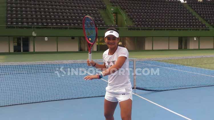 Priska Madelyn Nugroho, petenis muda Indonesia yang memulai debut PON di Papua. - INDOSPORT