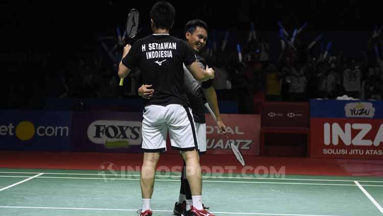 Ganda putra Indonesia, Mohammad Ahsan/Hendra Setiawan merayakan kemenangan sekaligus lolos ke final Indonesia Open 2019.