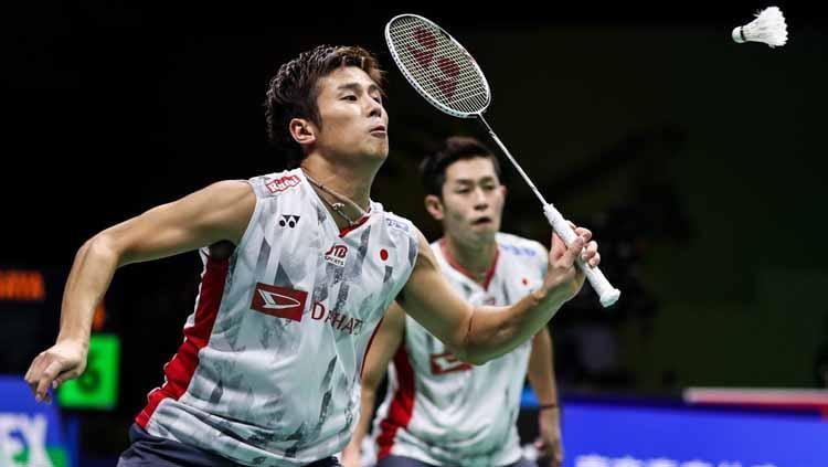 Ganda putra Jepang, Takuro Hoki/Yoga Kobayashi tak bisa menyembunyikan perasaan bahagianya usai menjadi juara di Thailand Open 2022. - INDOSPORT
