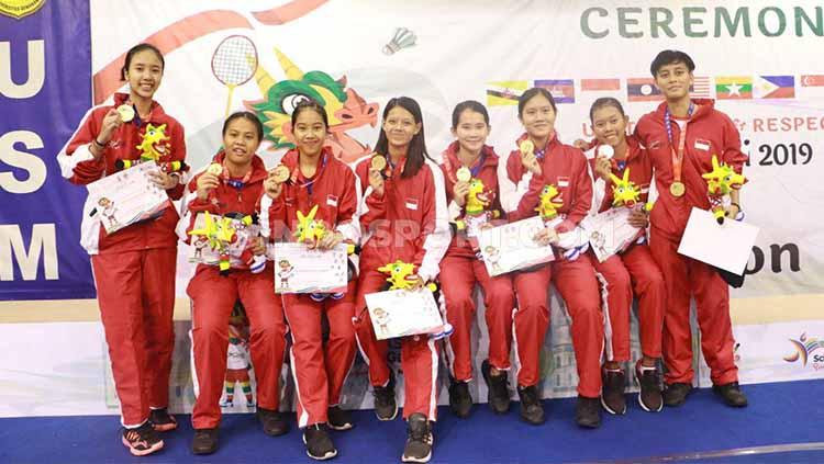 Kandaskan Malaysia, Indonesia berhasil mengawinkan medali emas bulu tangkis beregu Asean Schools Games (ASG) 2019. Foto: Zainal Hasan/INDOSPORT - INDOSPORT