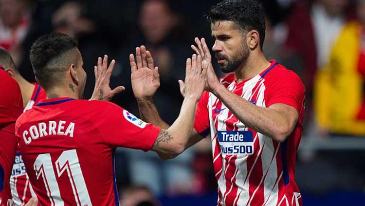 Indosport - Angel Correa (kiri) dan Diego Costa, dua striker Atletico Madrid.