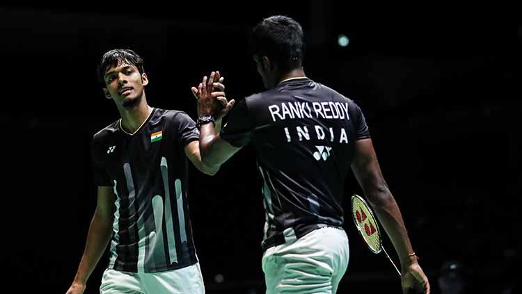 Pasangan India, Satwiksairaj Rankireddy/Chirag Shetty dalam ajang Japan Open 2019 di Chofu, Jepang. Shi Tang/Getty Images