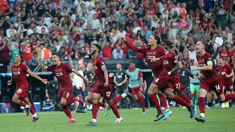 Para pemain Liverpool lari gembira setelah mereka menentukan sebagai juara Piala Super Eropa melawan Chelsea. Kamis, (15/08/19) Istanbul, Turkey. Metin Pala/Anadolu Agency/Getty Images