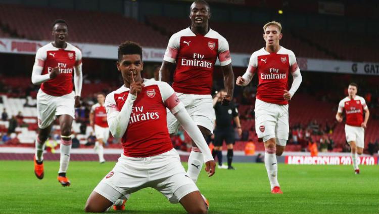Tyreece John-Jules saat cetak gol bersama Arsenal.