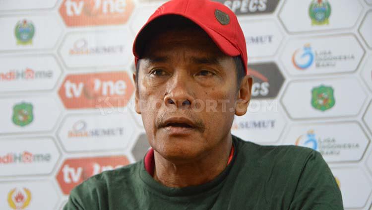 Pelatih PSMS Medan, Abdul Rahman Gurning menyebut kurangnya konsentrasi pemain yang jadi faktor kekalahan timnya takluk dari Perserang Serang. - INDOSPORT