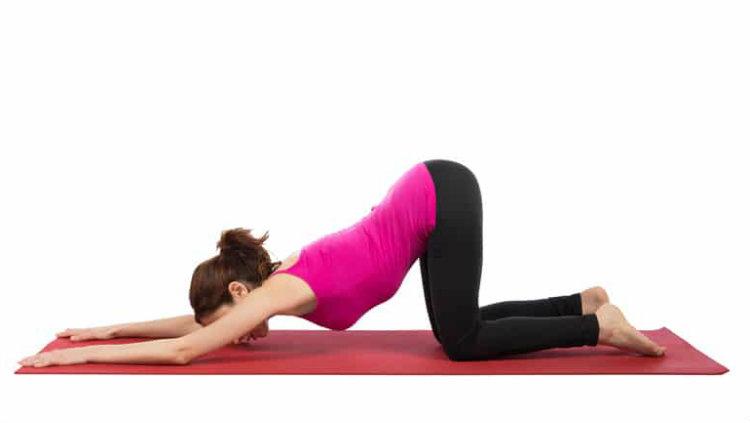 Melting heart pose. Copyright: Yoga Journal
