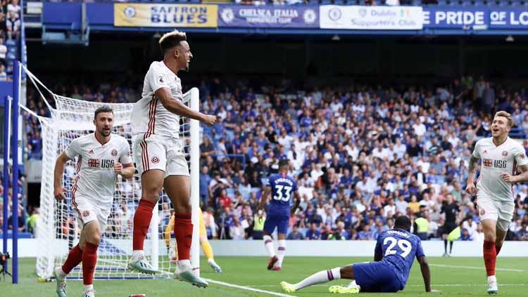 Callum Robinson merayakan gol pada laga Chelsea vs Sheffield United di Liga Inggris 2019/2020, Sabtu (31/08/19). Copyright: Twitter/@SheffieldUnited