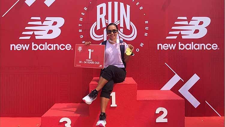 Triyaningsih, juara kategori 30-34 tahun New Balance Run On 2019 Minggu, 15 September 2019 di Qbig BSD City, Tangerang. - INDOSPORT