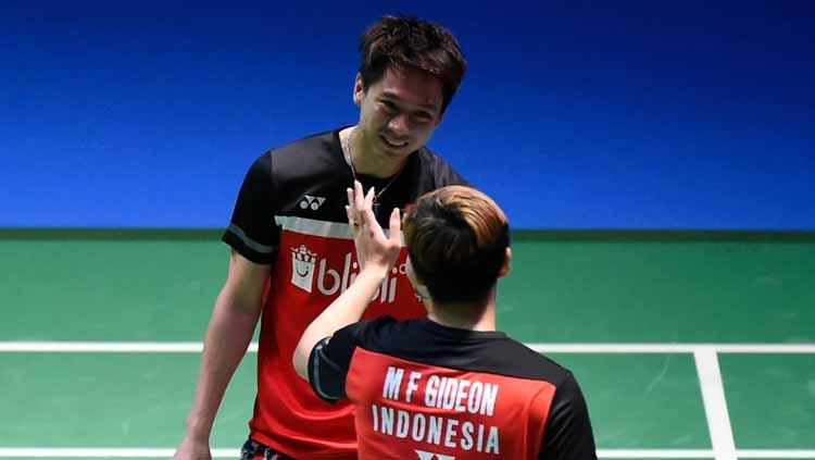 Berita sportainment: asangan ganda putra Indonesia, Kevin Sanjaya Sukamuljo/Marcus Fernaldi Gideon, menikmati liburan dengan caranya masing-masing. Matt Roberts/Getty Images. - INDOSPORT