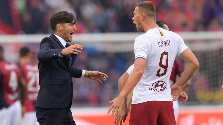 Skuat AS Roma, termasuk Edin Dzeko, merayakan kemenangan 2-1 atas Bologna dalam lanjutan Liga Italia Serie A 2019/20. Copyright: Twitter @ASRomaEn