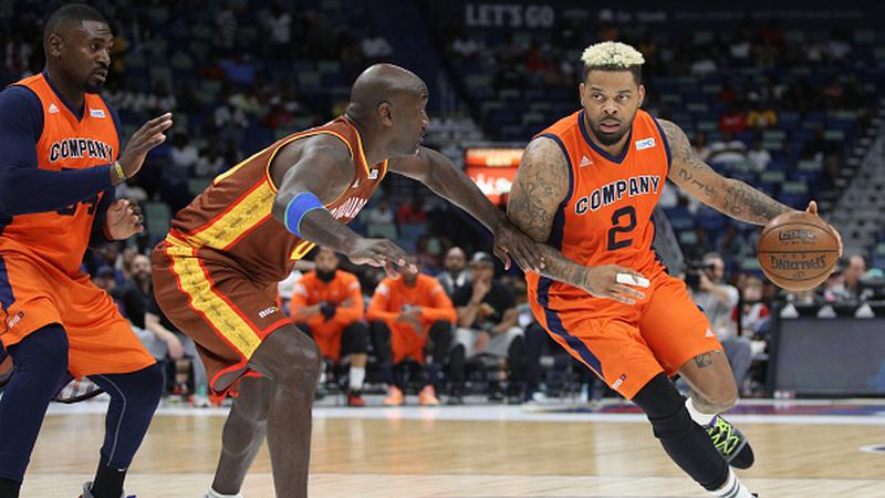Andre Emmett (kanan) saat masih aktif sebagai pemain basket - INDOSPORT