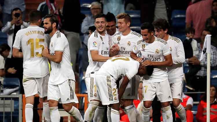 Selebrasi pemain Real Madrid. Copyright: Anadolu Agency/GettyImages