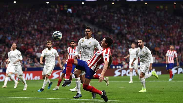 Suasana pertandingan antara Atletico Madrid vs Real Madrid di Liga Spanyol. - INDOSPORT