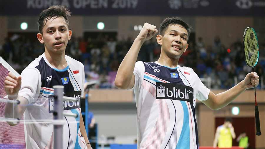 Terdapat hal unik yang terjadi antara Fajar Alfian (kanan) dengan sang pelatih, Herry IP di All England 2020.