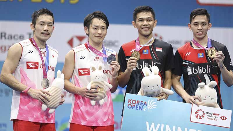 Pasangan ganda putra Indonesia, Fajar Alfian/M.Rian Ardianto berhasil mengalahkan pebulutangkis asal Jepang Takeshi Kamura/Keigo Sonoda di final Korea Open 2019. - INDOSPORT