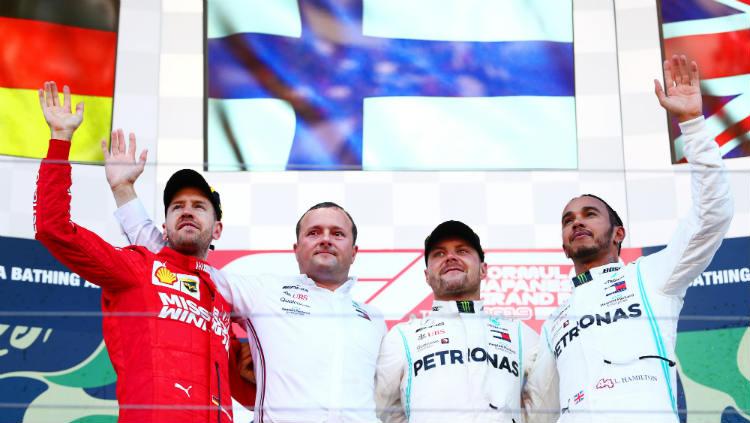 Podium F1 GP Jepang: Sebastian Vettel, Valtteri Bottas, dan Lewis Hamilton.
