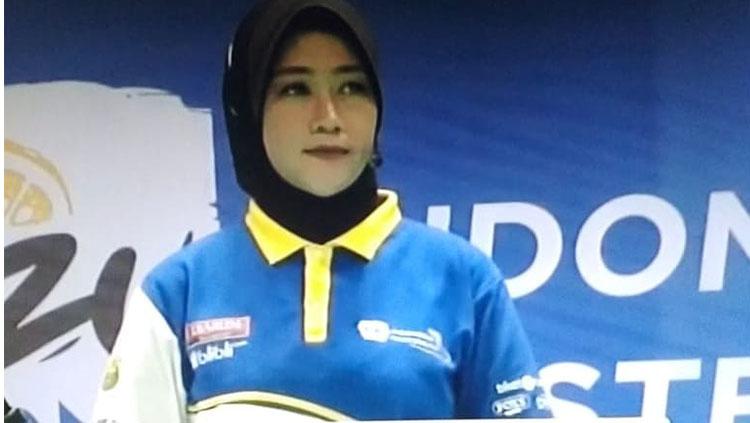 Wasit bulutangkis wanita asal Indonesia, Andi Purnama.